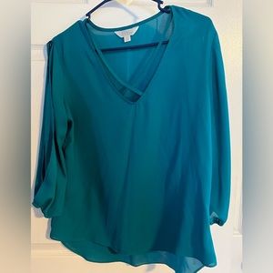 Beautiful blouse turquoise very light weight. Size medium